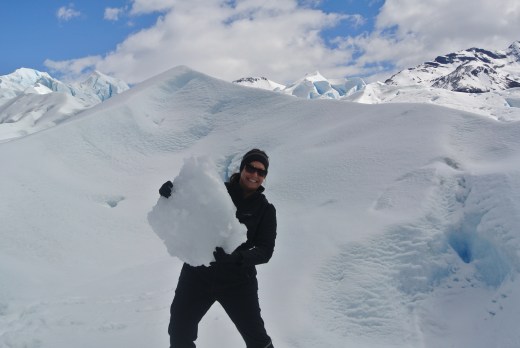 Manhandling blocks of ice.