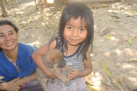 A sweet little girl and her pup.