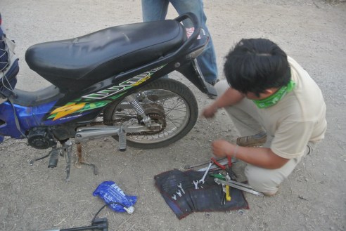 We got a flat tire on the way home.  Naturally we help by offering laughter and moral support.